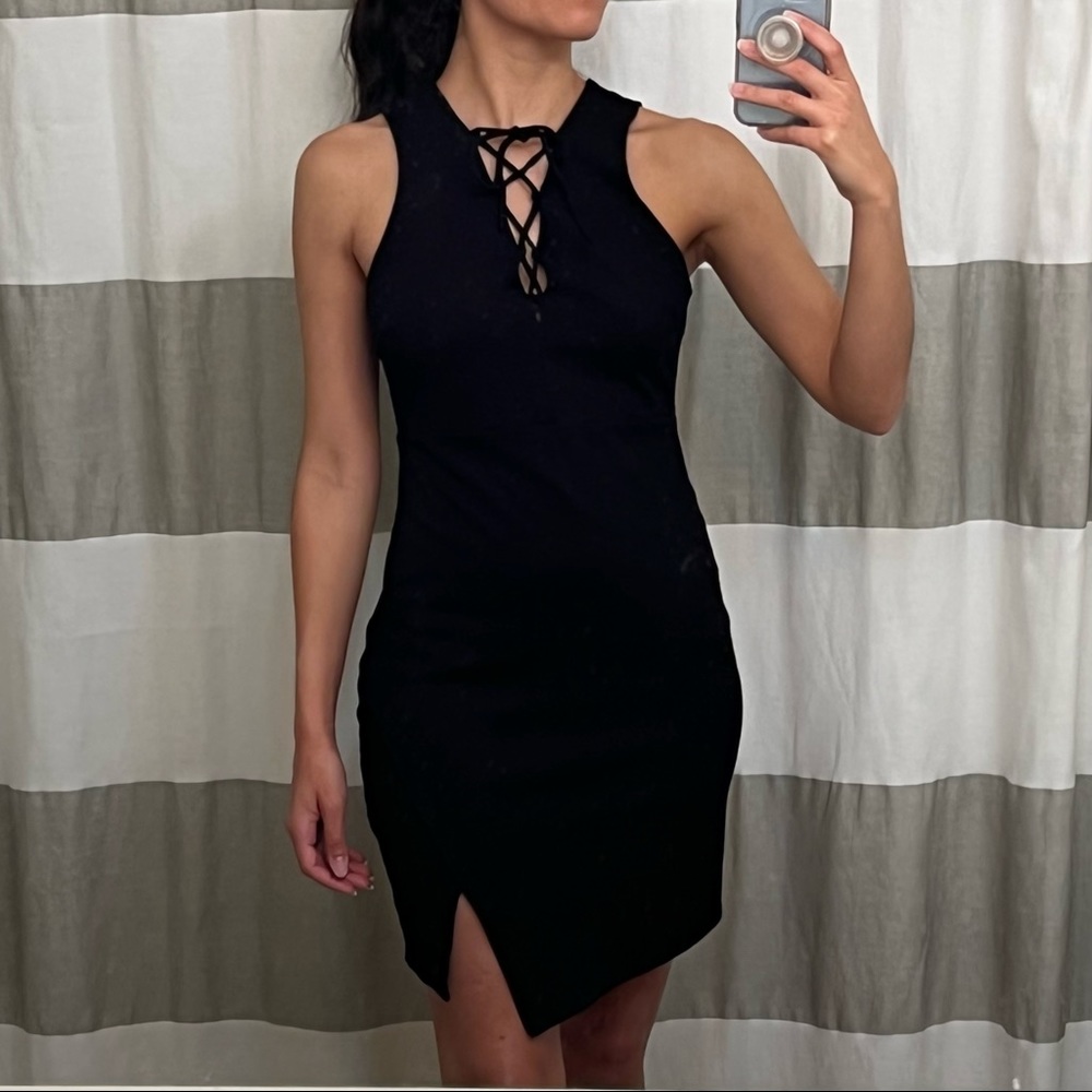SOPRANO black bodycon dress with lace up neckline asymmetrical hem
